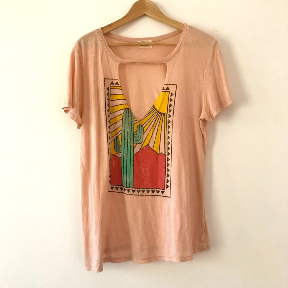 Project Social T pink graphic tee with desert landscape and neckline cut out